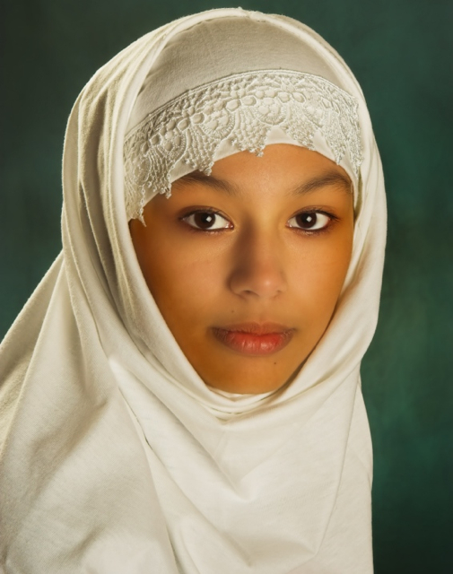 Young Moroccan woman in a white veil